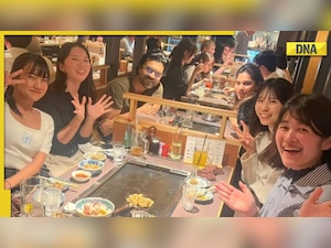 RRR star Ram Charan poses with Japanese fans in restaurant, receives customised gifts from admirers