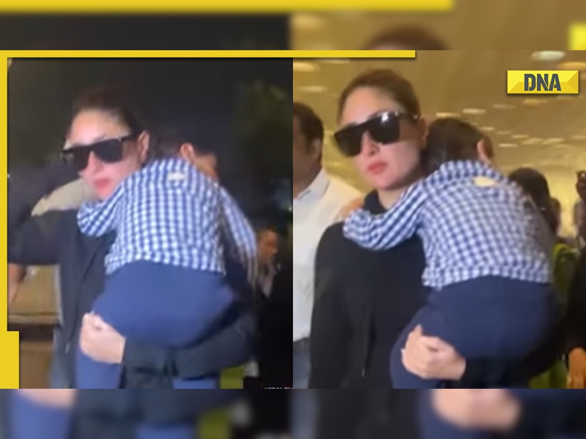 Kareena Kapoor carries son Jeh Ali Khan in her arms as they arrive at Mumbai airport