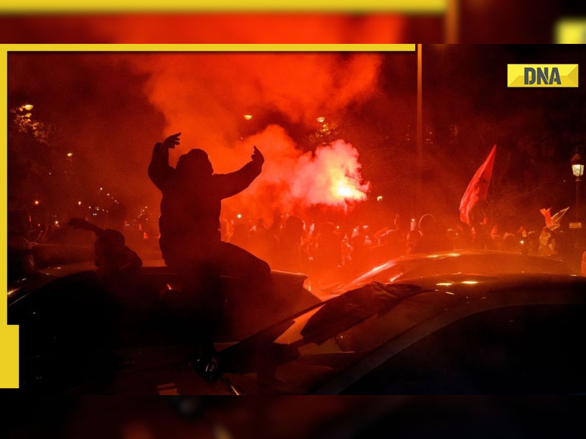 Moroccan fans clash with police after FIFA World Cup defeat against France in semi-final