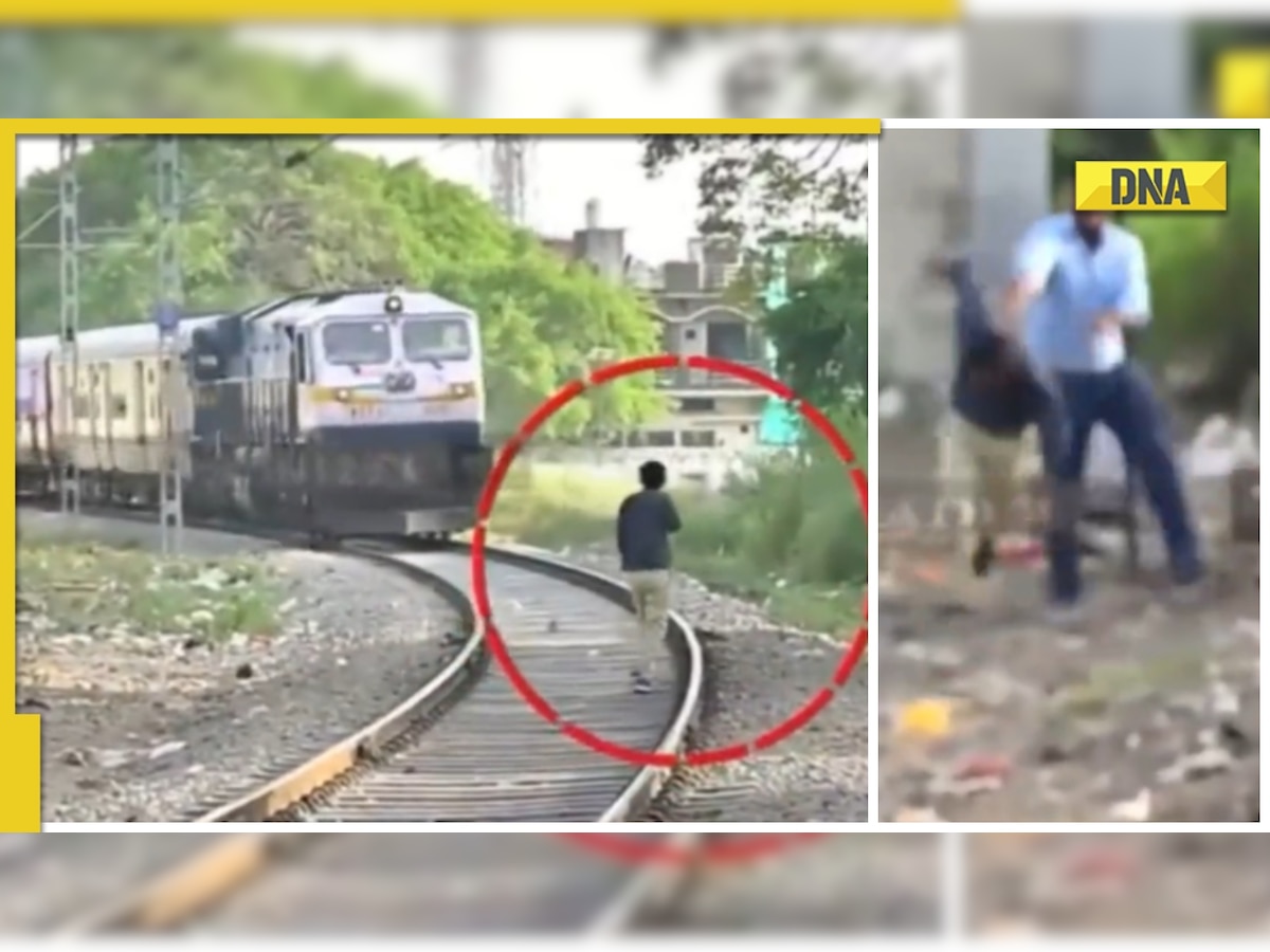 Man tries to stop train while standing on tracks, gets slapped by loco pilot - WATCH viral video