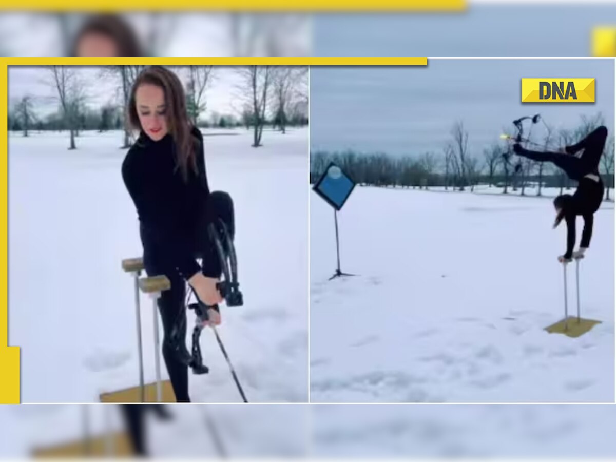 Girl shoots balloon with flaming arrow while doing a handstand, viral video amazes netizens