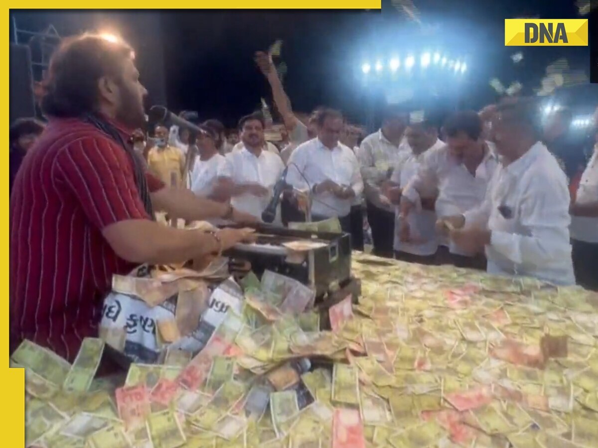 Viral video: Folk singer showered with wads of cash during 'bhajan' performance in Gujarat, watch