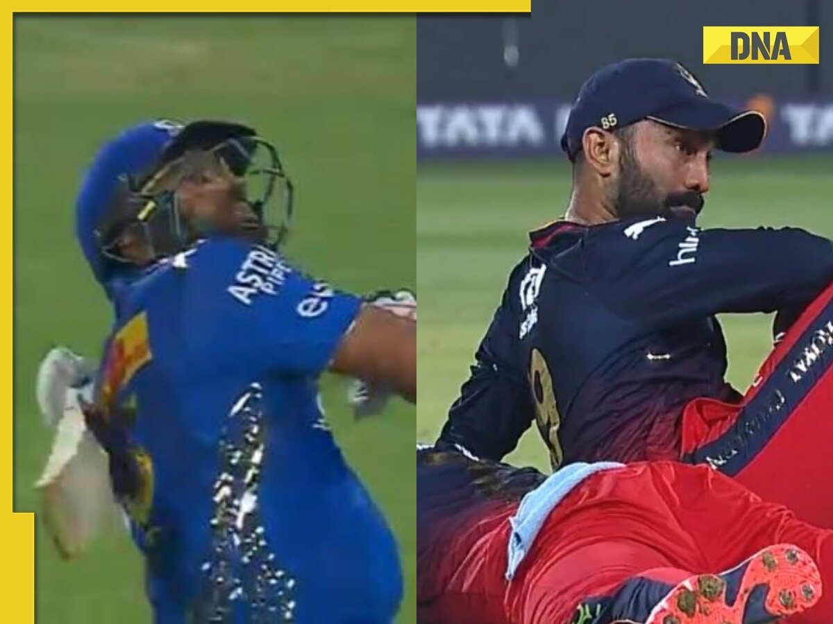 Watch: Dinesh Karthik, Mohd Siraj in massive collision as RCB drop Rohit Sharma sitter