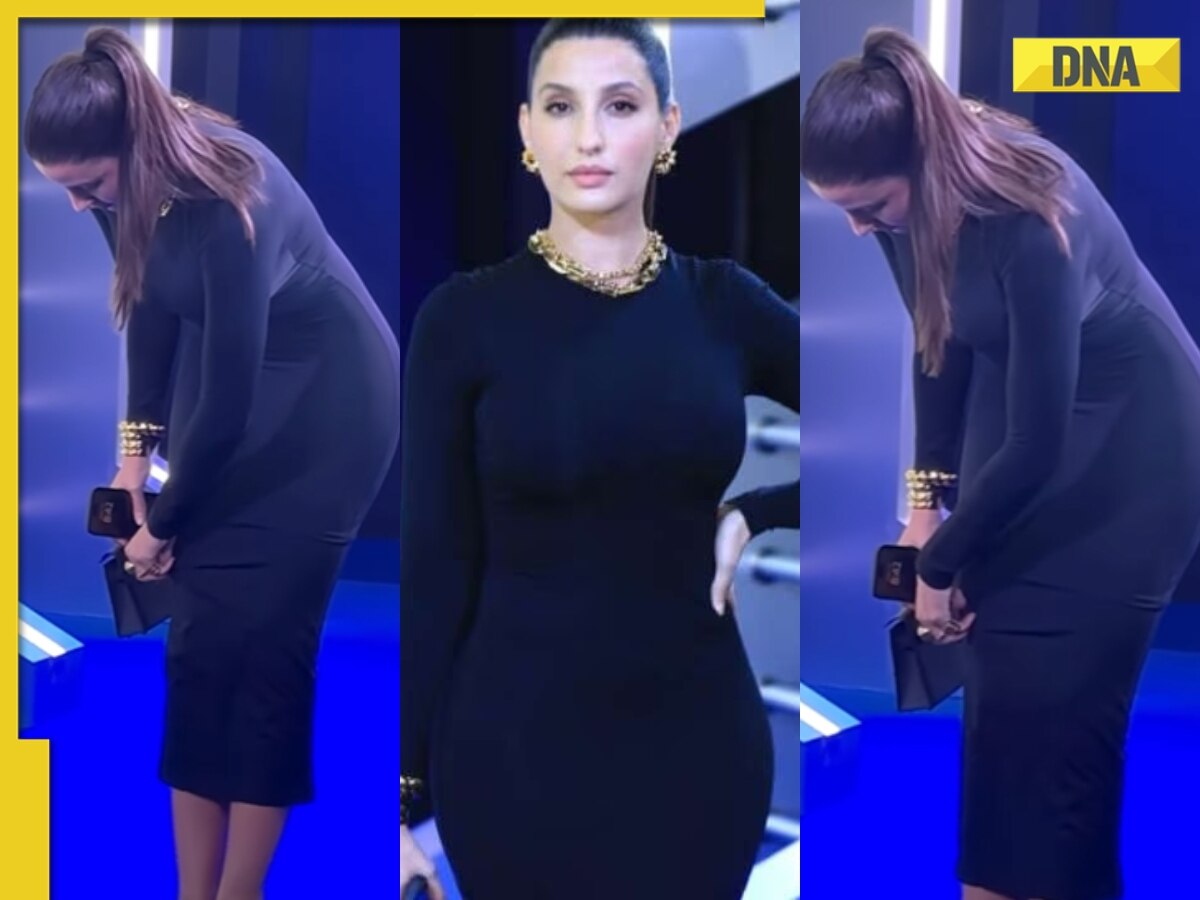 Nora Fatehi Grabs Eyeballs In Black Satin Dress, Raises Temperature With  Bold Look | People News | Zee News