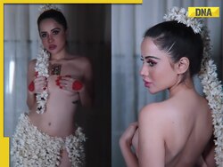 Urfi Javed draws internet's ire as she poses topless in see-through outfit made of gajra: 'Please ban her...'