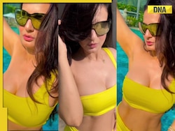 Viral video: Ameesha Patel raises temperature in sexy cleavage-baring bikini in pool, watch