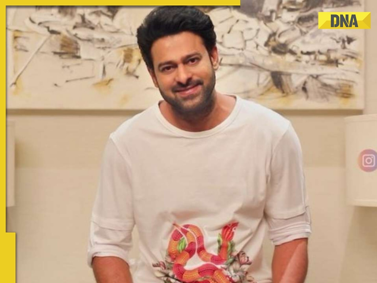 Prabhas looks cool in black as he poses with crew on sets of ...