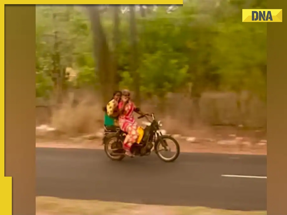 Woman in saree blows kisses while riding bike in this adorable viral