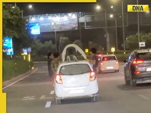 Gurugram: Man seen doing push-ups on top of moving car, detained after ...