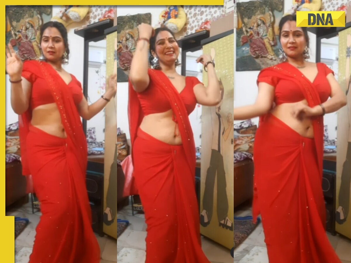 Desi woman in red sizzling saree dances to Tip Tip Barsa Paani, viral video burns internet photo