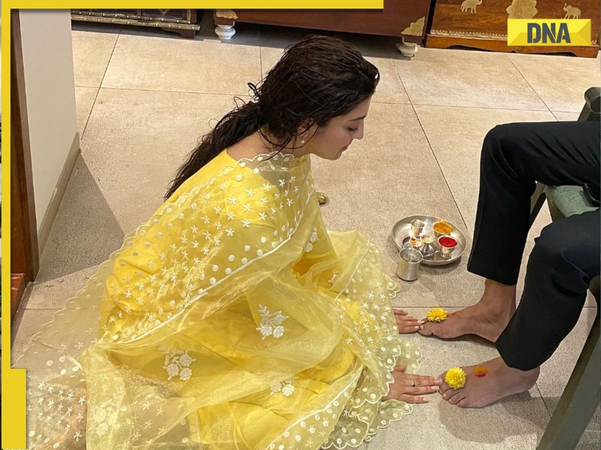 Pranitha Subhash touches husband's feet on Bheemana Amavasya