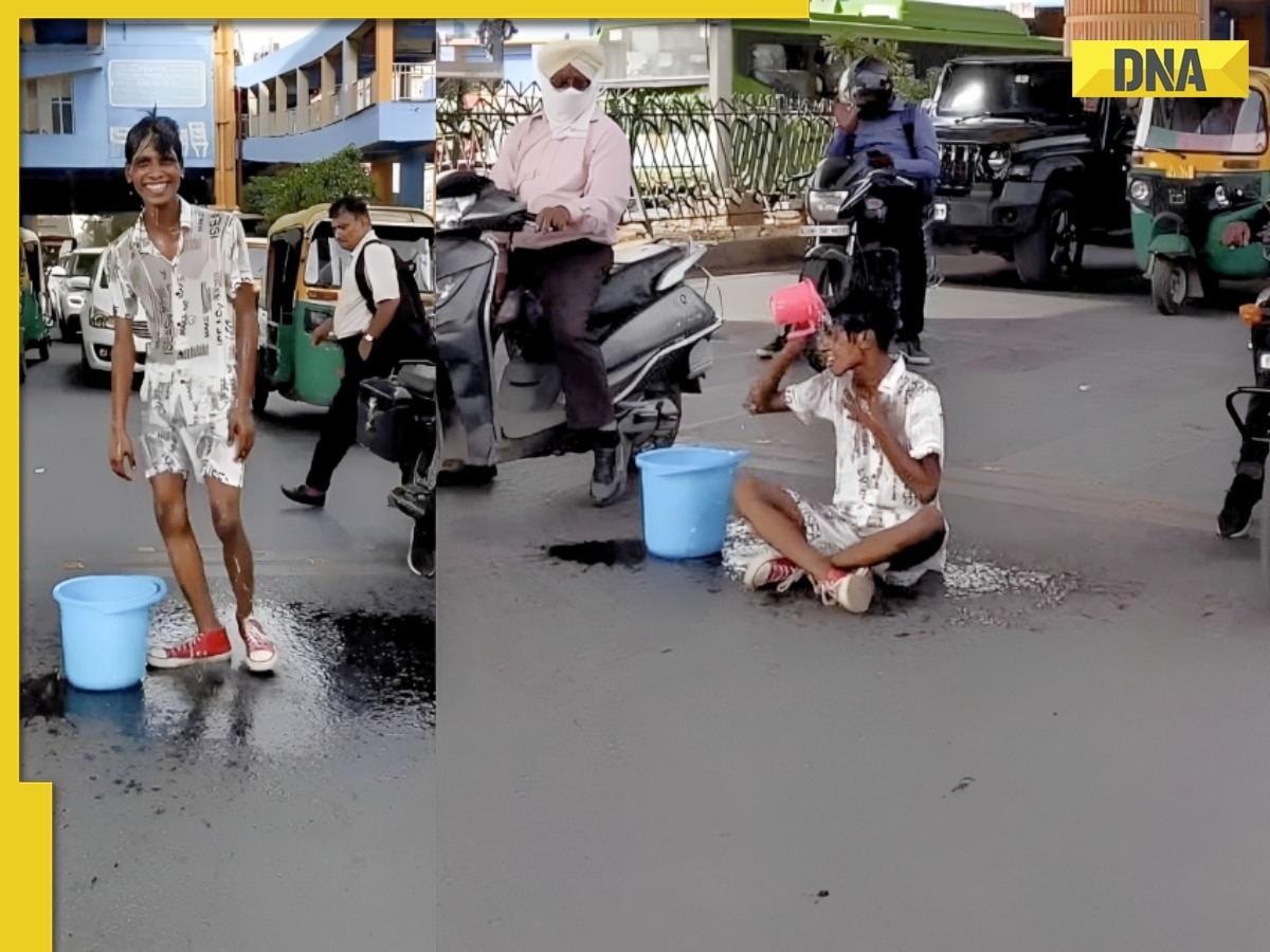 Boy takes bath on crowded road near Delhi's Laxmi Nagar metro station, viral video angers internet