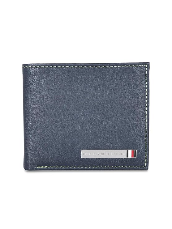 https://cdn.dnaindia.com/sites/default/files/2023/11/06/2614532-tommy-hilfiger-vihaan-leather-global-coin-wallet-for-men.jpg