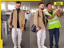 Watch: Virat Kohli leaves for South Africa to participate in 2-match Test series, poses for selfie with fan