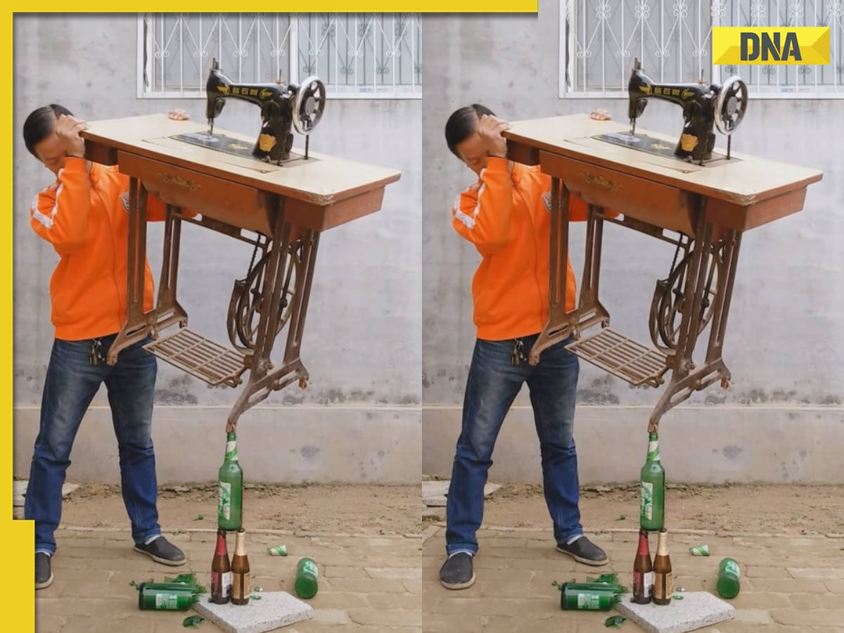 Viral video: Chinese man stuns internet by balancing sewing machine on glass bottles, watch