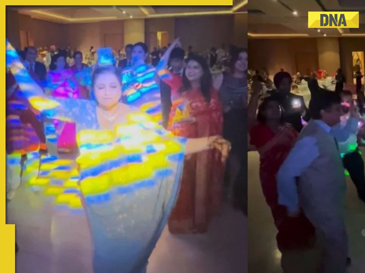 WATCH: video of groom's mother dancing with a glass of whisky on her head goes viral, WATCH