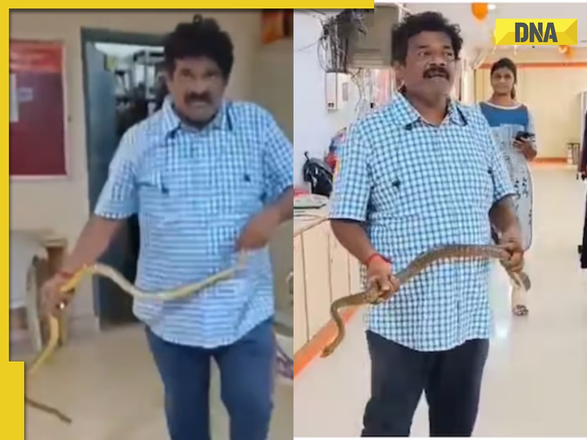 Viral video: Man fearlessly catches snake with bare hands in Visakhapatnam bank, watch