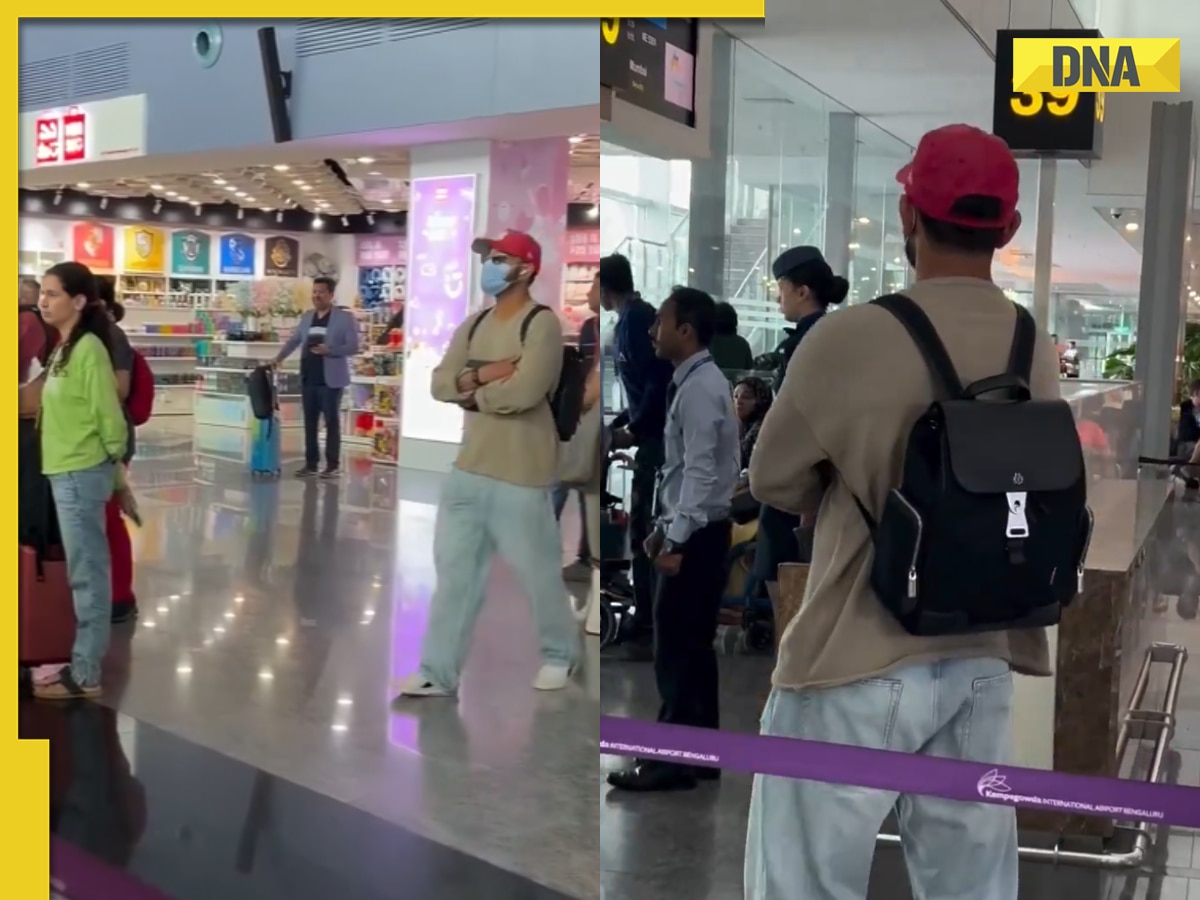 Virat Kohli with mask, goggles tries to go unnoticed at Bengaluru airport, gets spotted by fans, video goes viral