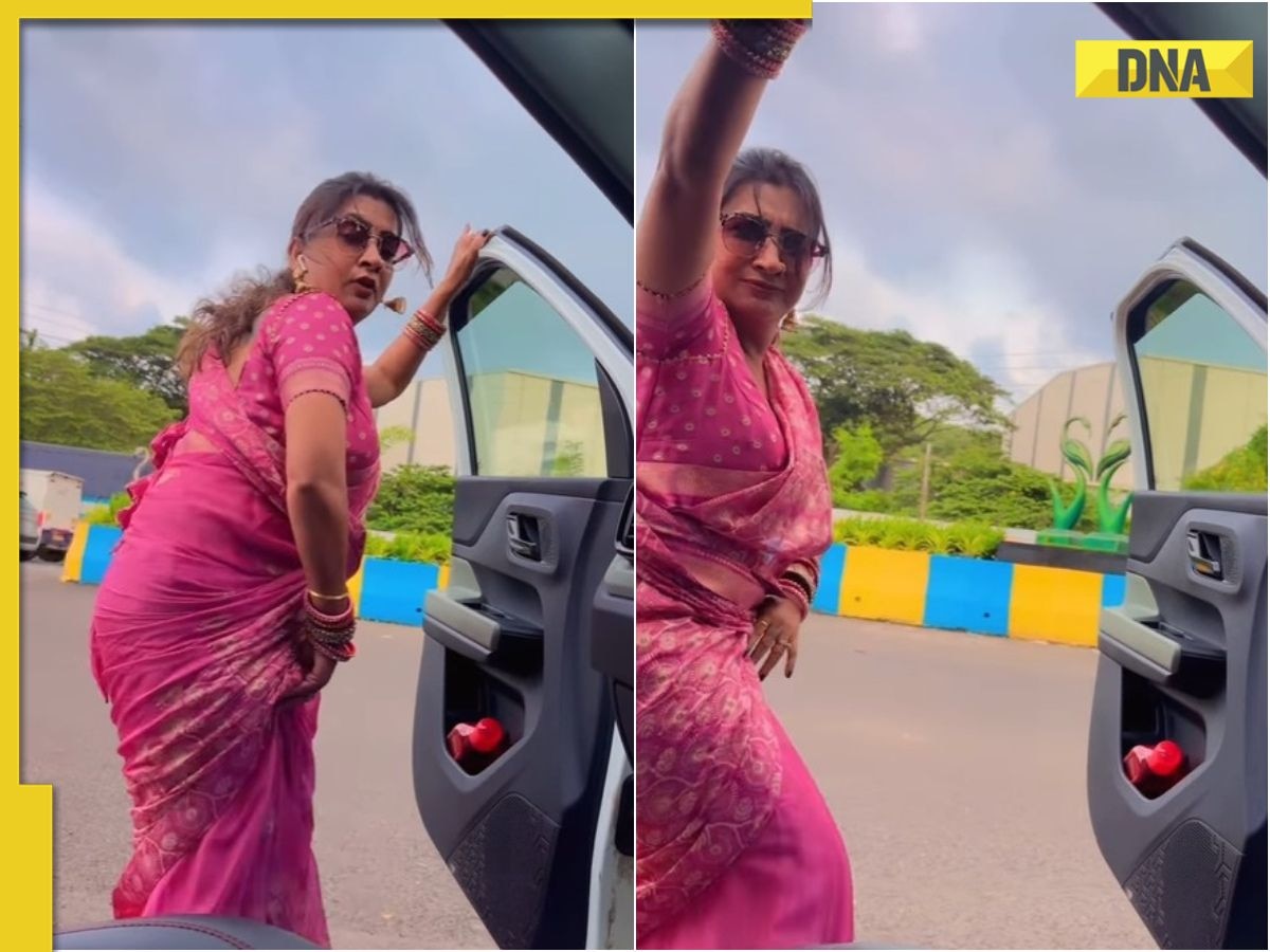 Viral video shows woman in saree dancing alongside moving car, leaves netizens awestruck, watch here