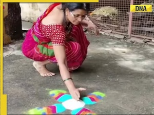 Watch: Clip shows woman creates unconventional rangoli just by throwing power, video goes viral