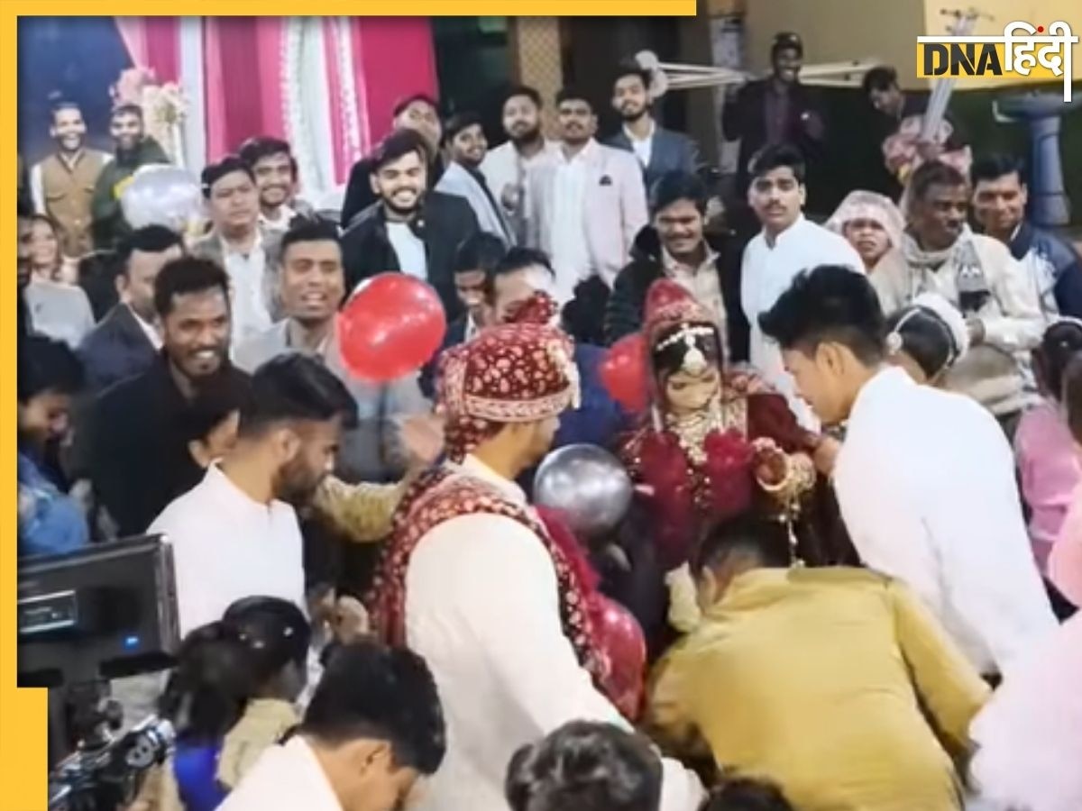 Viral: शादी में गुब्बारों की बारिश से हुआ बवाल, लूटने के लिए दूल्हा-दुल्हन के ऊपर ही टूट पड़े बाराती, देखें Video 