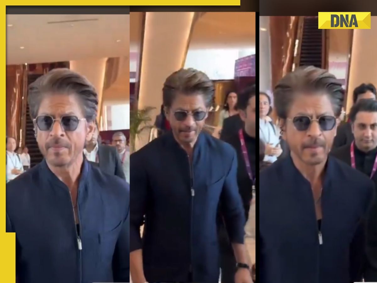 Shah Rukh Khan looks dapper in navy jacket and trousers with statement diamond hoops at WAVES 2025
