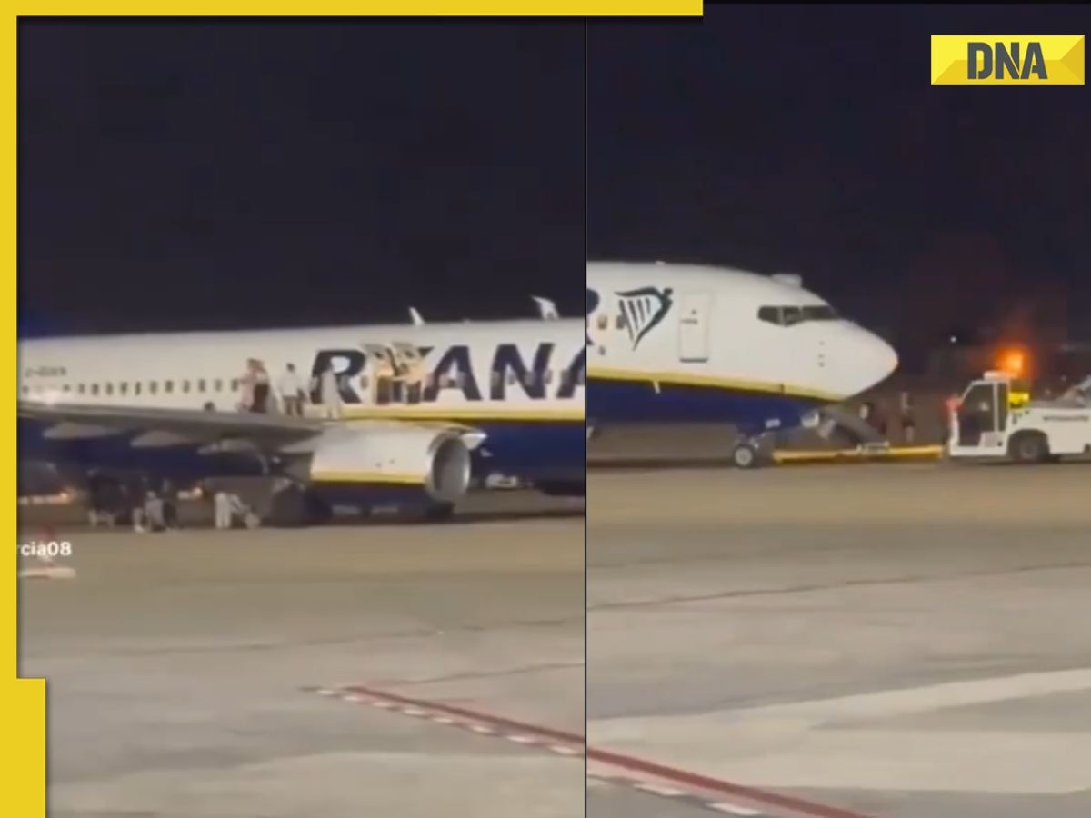 Fire scare triggers panic on Ryanair Boeing 737, passengers seen jumping off wing, WATCH video