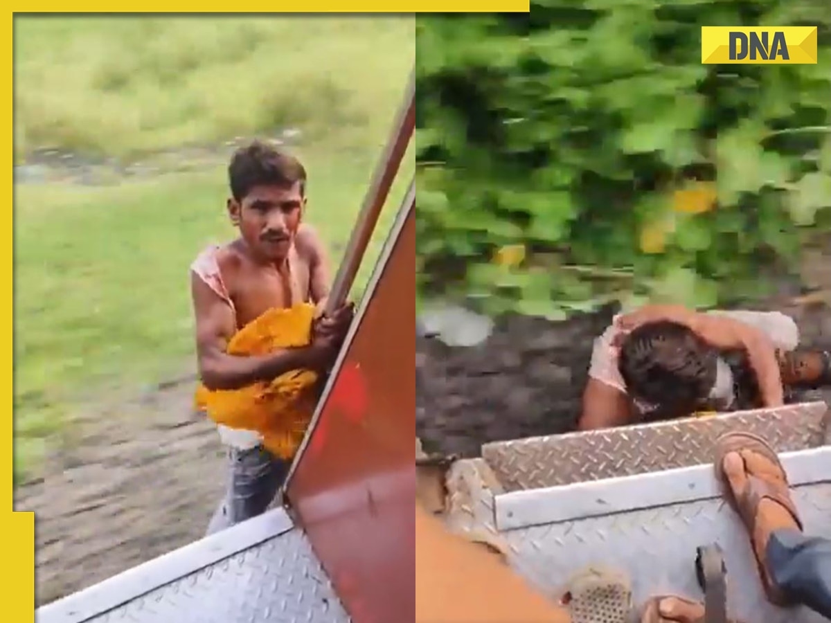 SHOCKING! Thief hangs from moving train after stealing mobile phone, later jumps when..., watch viral video 