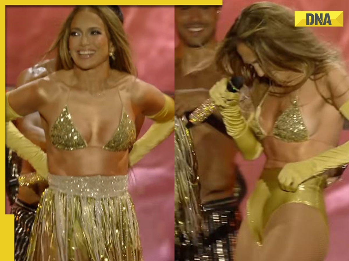 jennifer lopez dress falls off Jennifer Lopez suffers a wardrobe malfunction as her corset gown gets stuck  while leaving the Office Romance premiere https://trib.al/8XCjheQ