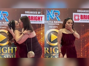Female fan forcefully kisses Nikita Rawal on lips at red carpet, video goes viral - Watch