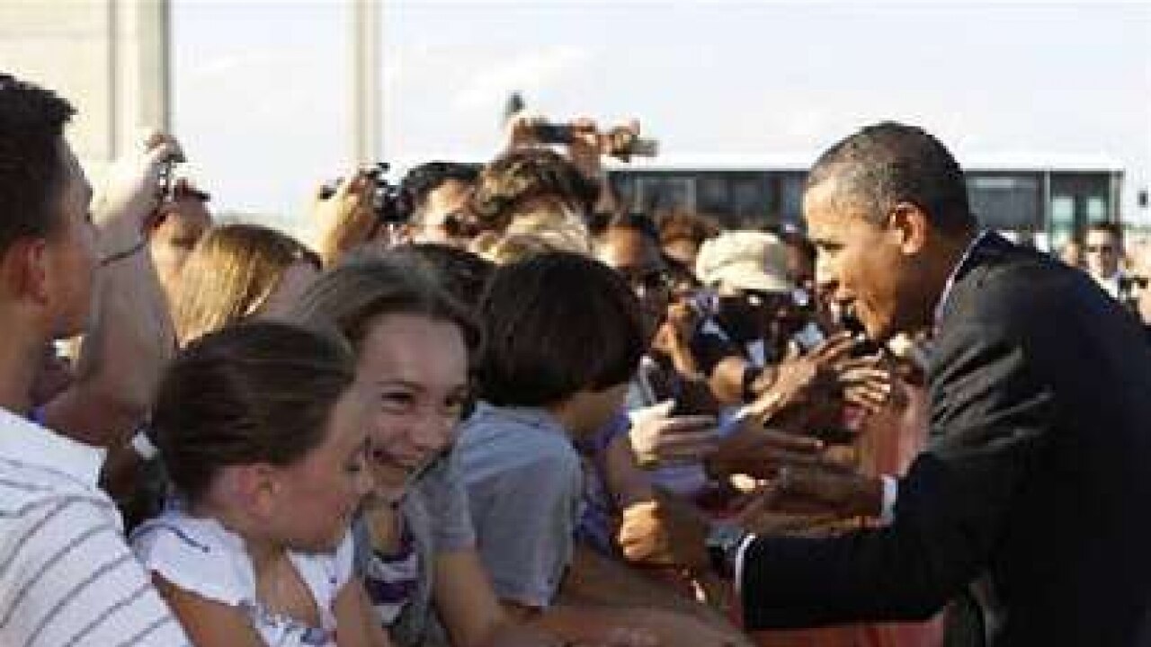 Obama touts job creation as midterm elections near