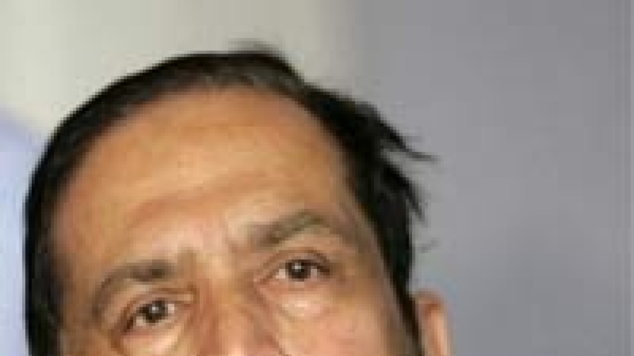 Bjp demands early interrogation of suresh kalmadi