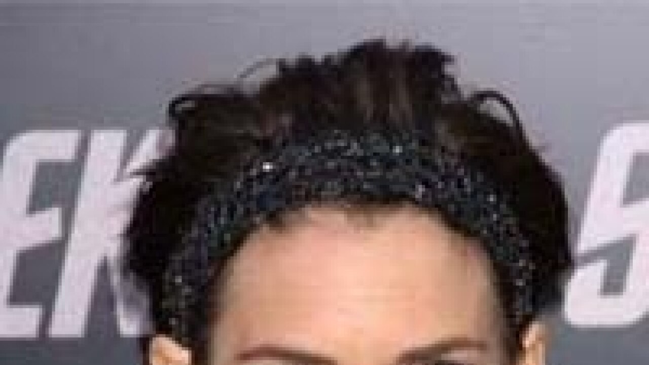 Winona Ryder looks breathless in incredibly tight bodice dress