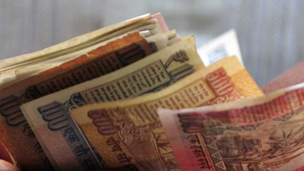 Rupee pares initial gains; still up 76 paise vs dollar