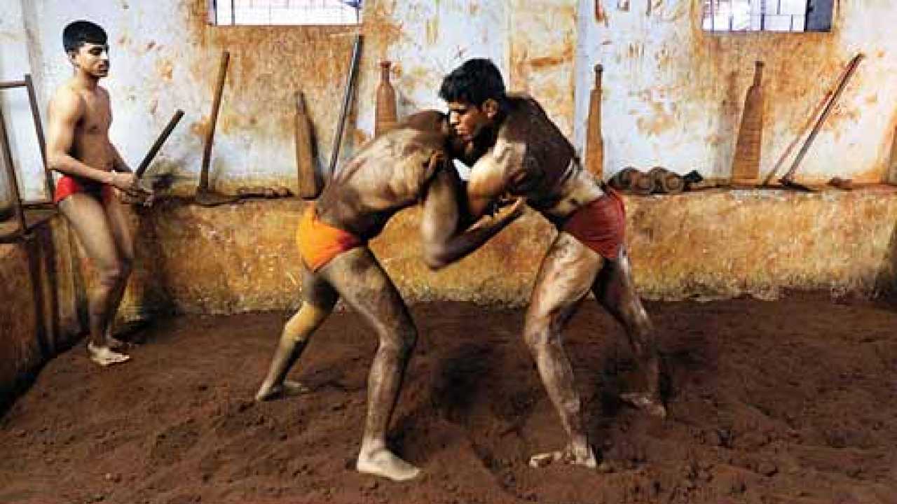 Kushti wrestlers fighting Poster by Ruben Vicente - Fine Art America