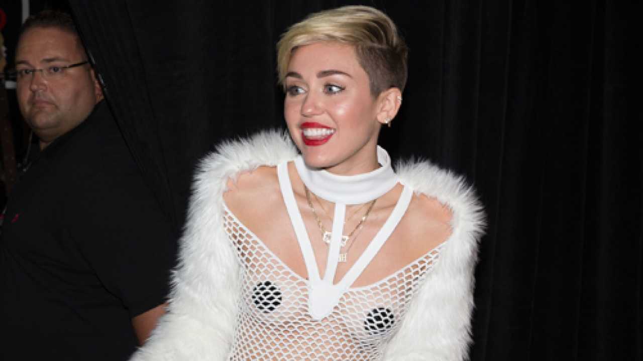 Miley Cyrus performs in pasties, see-through dress at iHeartRadio Music  Festival