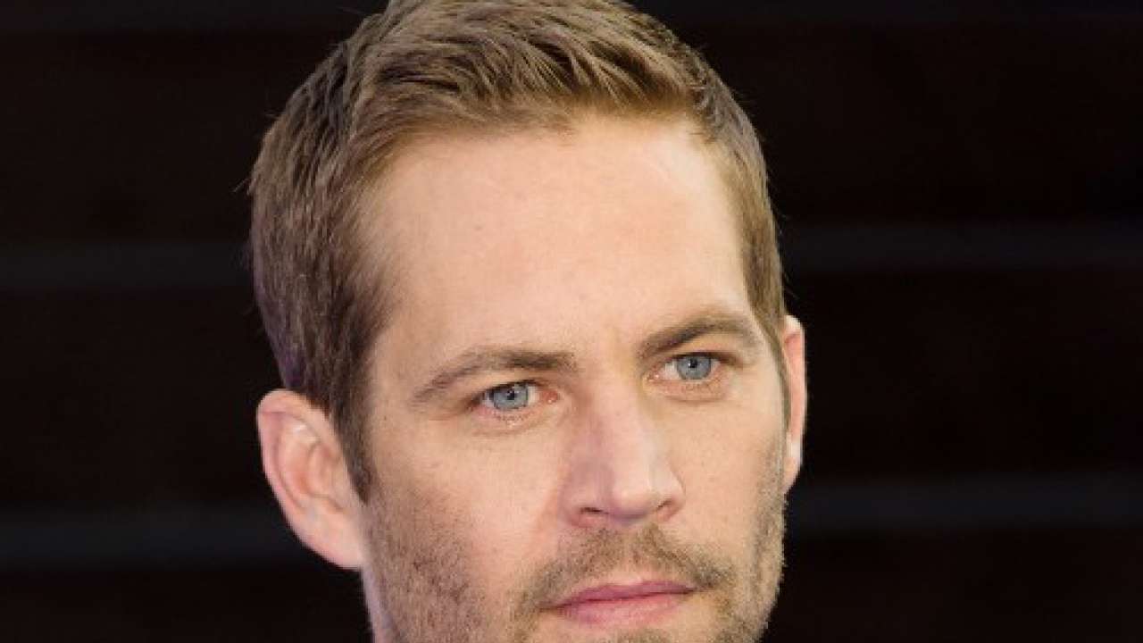 Paul walker's friends 'tried to put out the raging flames and save him after car crashed'