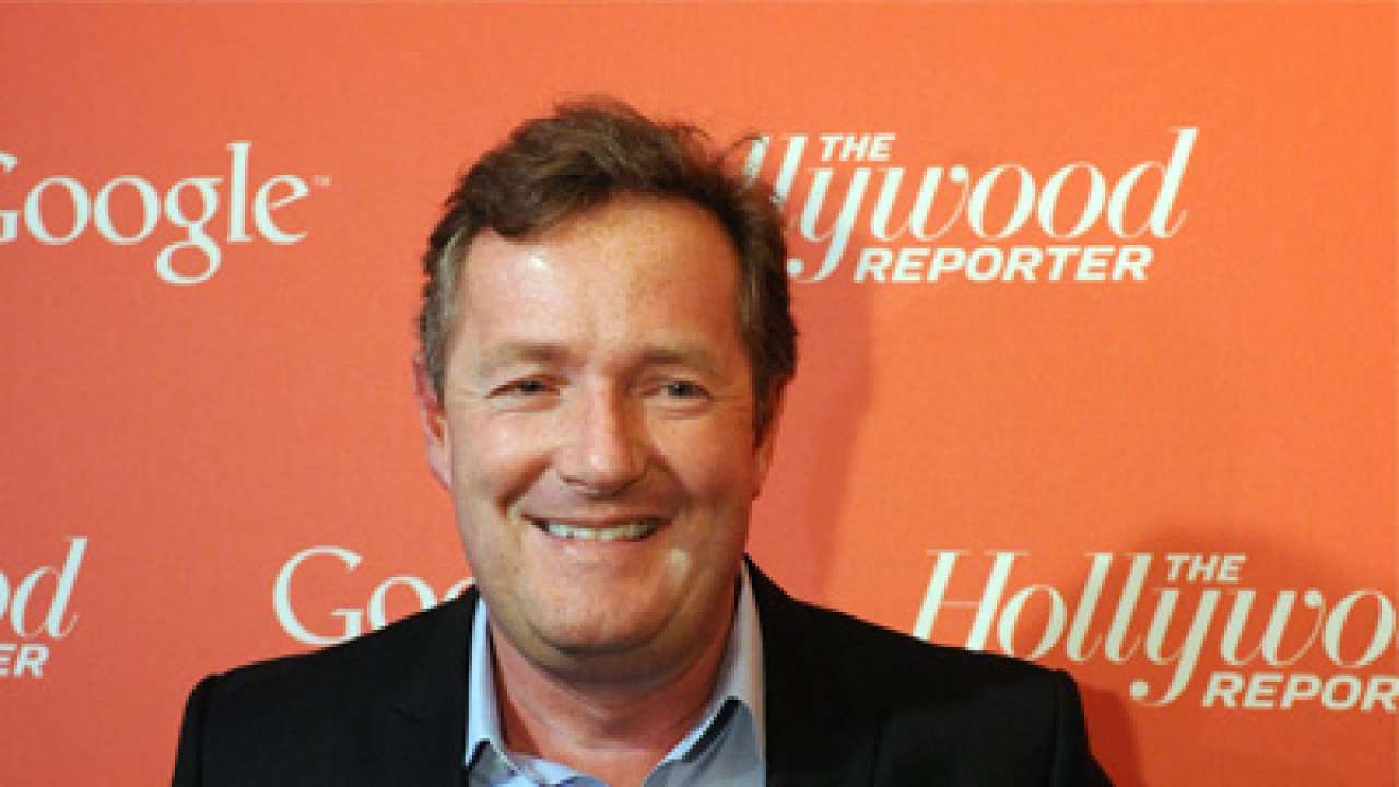 Piers takes a dig at Robin van Persie on Twitter post Manchester