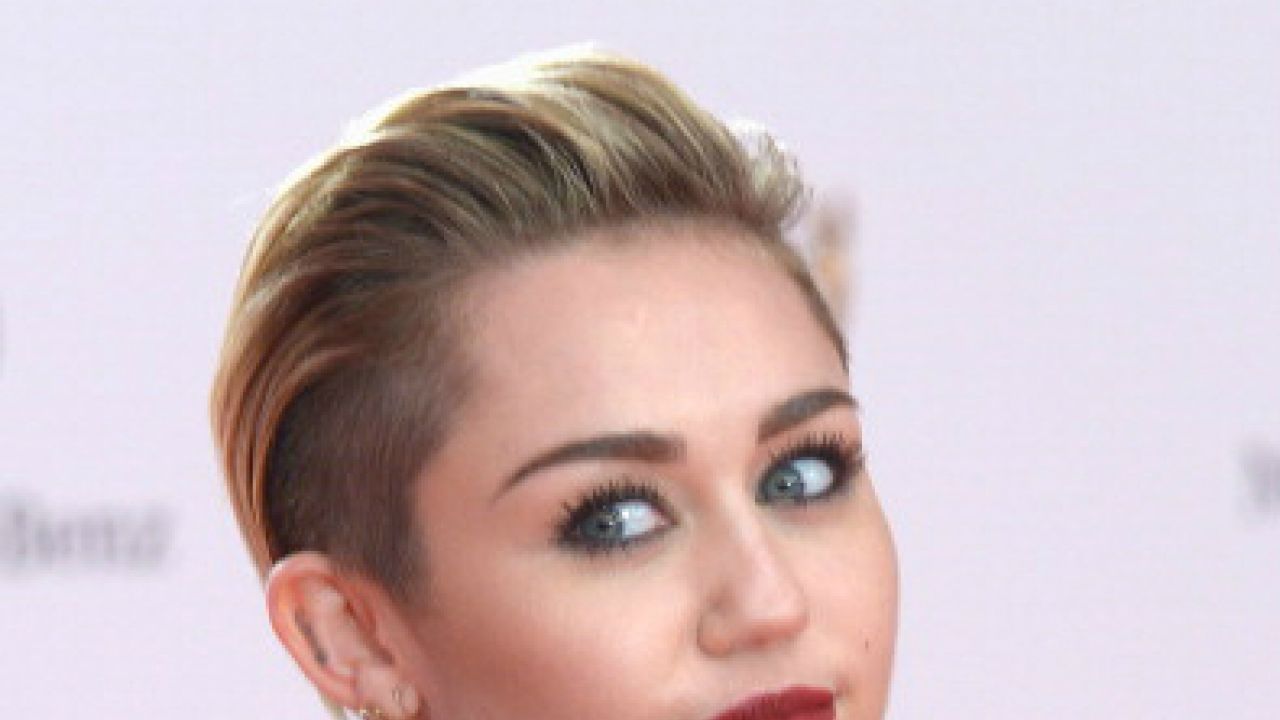 Miley Cyrus faces backlash for painting pet pig's toenails