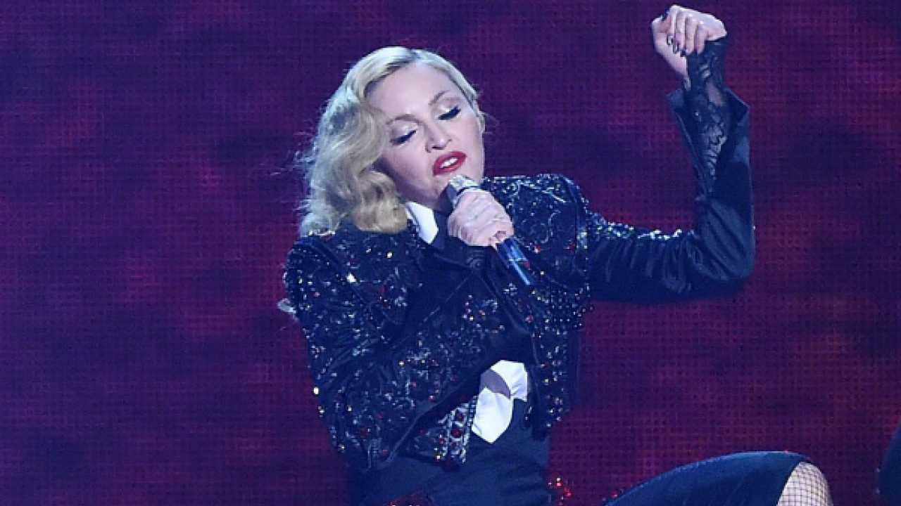 Madonna sparks outrage with online post of her kissing Snow White on ...