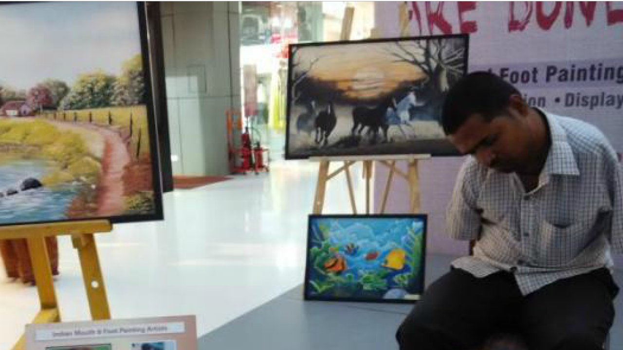 Foot Artist Foot painting becomes means of livelihood for physically challenged artist