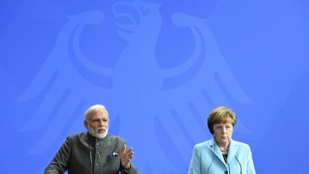 German Chancellor Angela Merkel and Indian Prime Minister Narendra Modi address a press conference on their talks in Berlin April 14, 2015. AFP.