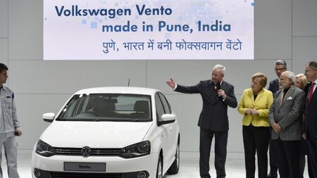 Presenting a Volkswagen Vento car made in India, at the Hannover Messe industrial trade fair in Hanover, central Germany on April 13, 2015.