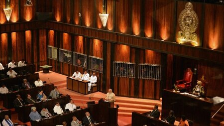 Indian Prime Minister Narendra Modi (C) delivering an address to the Sri Lankan parliament in Colombo on March 13, 2015.