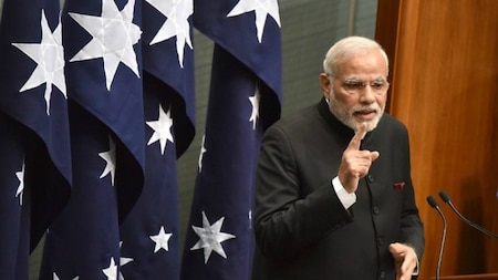 Indian Prime Minister Narendra Modi delivers a speech to members and senators at Parliament House in Canberra on November 18, 2014.