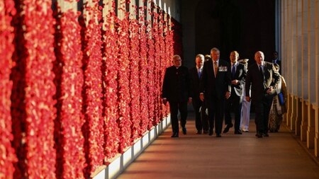 Indian Prime Minister Narendra Modi (L) is escorted through the Australian War Memorial.