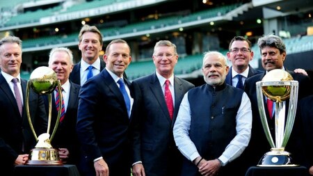 Posing with the World Cup trophy during a reception at the Melbourne Cricket Ground in Melbourne on November 18, 2014.