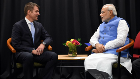 India's Prime Minster Narendra Modi (R) chats to New South Wales State Premier Mike Baird during their meeting in Sydney on November 17, 2014.