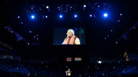 Indian Prime Minister Narendra Modi speaks to a crowd during a rally on Prime Minister Modi's first official visit to Canada