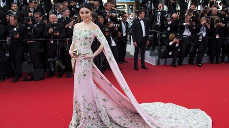 Wearing Ralph Russo Couture, Chinese actress Fan Bingbing made a grand entrance in a dress in which sleeves turn into a long flowy cape (Reuters)
